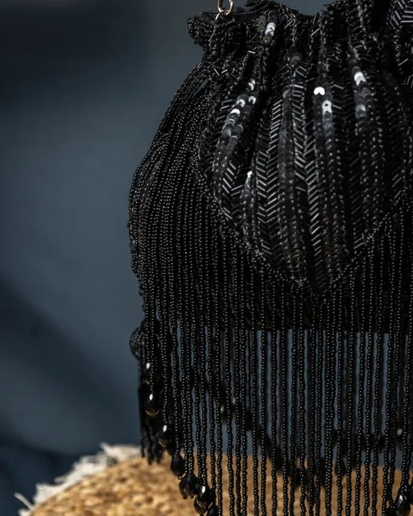 Sitara_Black_Fringe_Potli_–_Hand-Beaded_Party_Bag_with_Crystal_Tassels