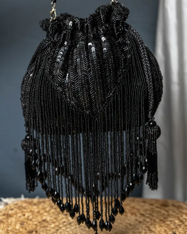 Sitara_Black_Fringe_Potli_–_Hand-Beaded_Party_Bag_with_Crystal_Tassels