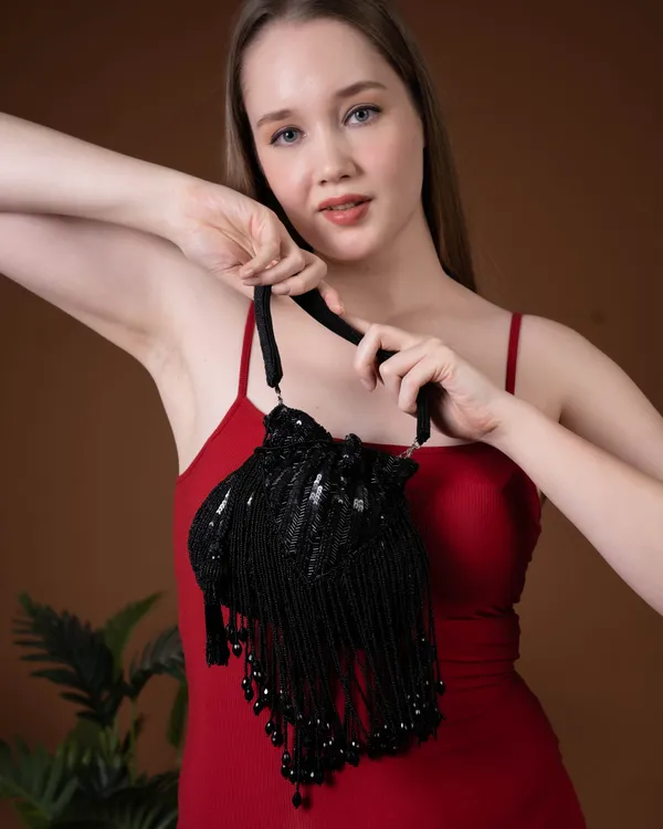 Sitara_Black_Fringe_Potli_–_Hand-Beaded_Party_Bag_with_Crystal_Tassels