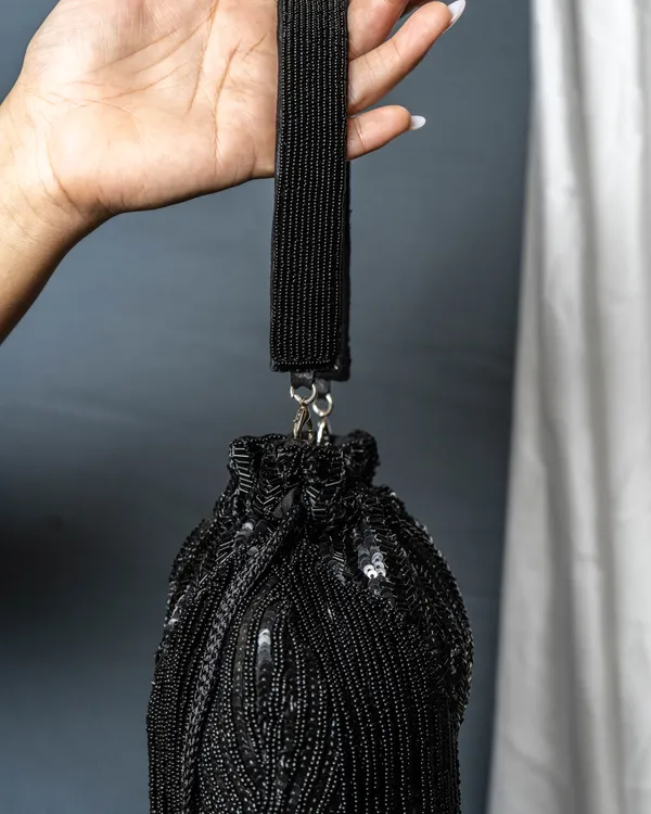 Sitara_Black_Fringe_Potli_–_Hand-Beaded_Party_Bag_with_Crystal_Tassels
