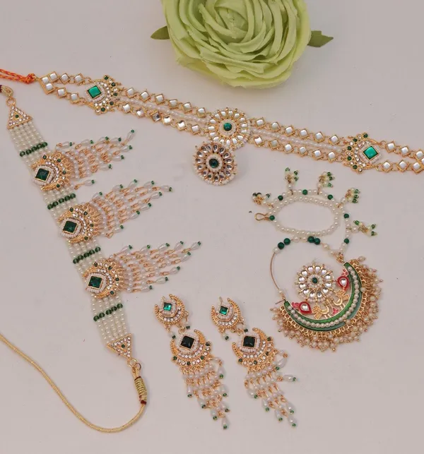 Gold_Toned_Kundan_Green_Stone_Accents_Elegant_Bridal_Jewellery_Set