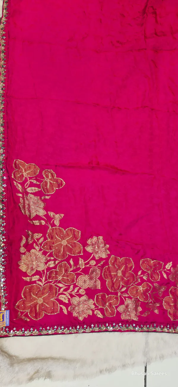Pink_Georgette_Saree_With_Embroidered_Border_And_Floral_Motifs