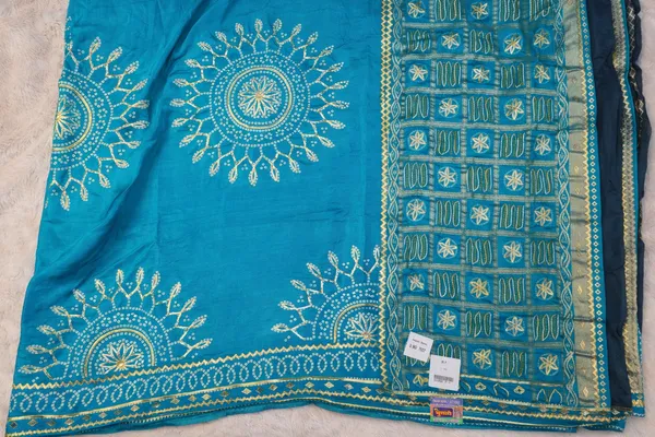 Turquoise_Blue_Bandhani_Saree_With_Golden_Embroidery_And_Border