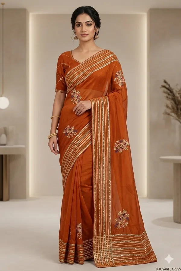 Orange_Embroidered_Saree_With_Golden_Border_And_Floral_Motifs