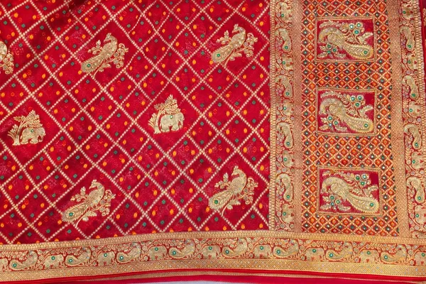 Traditional_Red_Banarasi_Silk_Saree_With_Golden_Zari_Work_And_Green_Stone_Embellishments