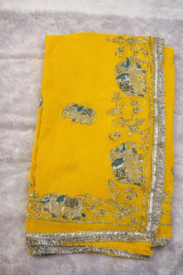 Yellow_Georgette_Saree_With_Floral_Embroidered_Border