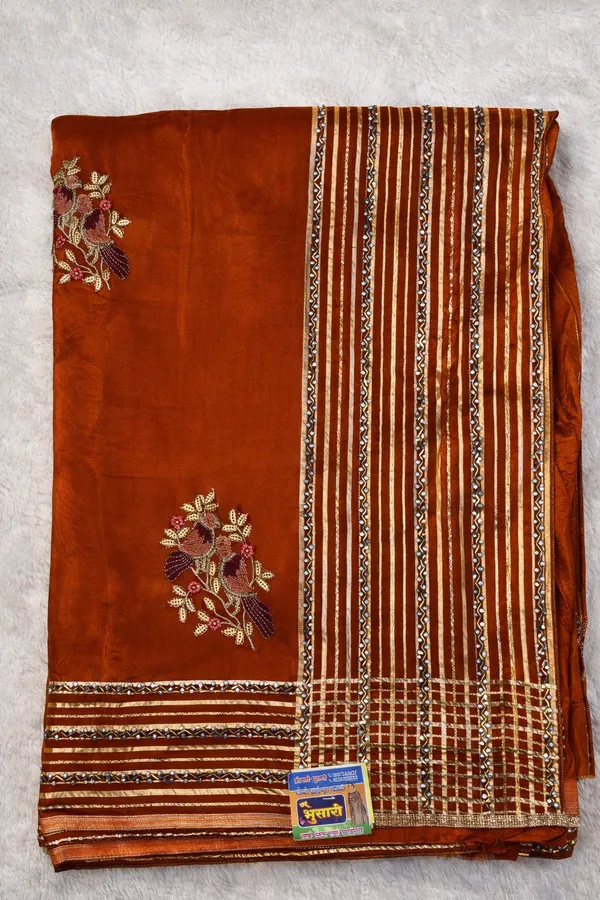 Orange_Embroidered_Saree_With_Golden_Border_And_Floral_Motifs