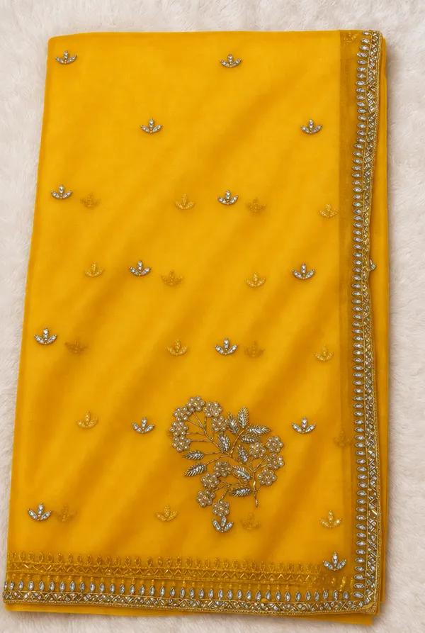 Yellow_Georgette_Saree_With_Embellished_Border_And_Stone_Work