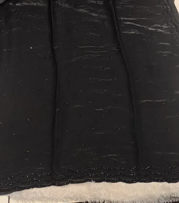 Black_Georgette_Saree_With_Embellished_Border_And_Sequin_Work