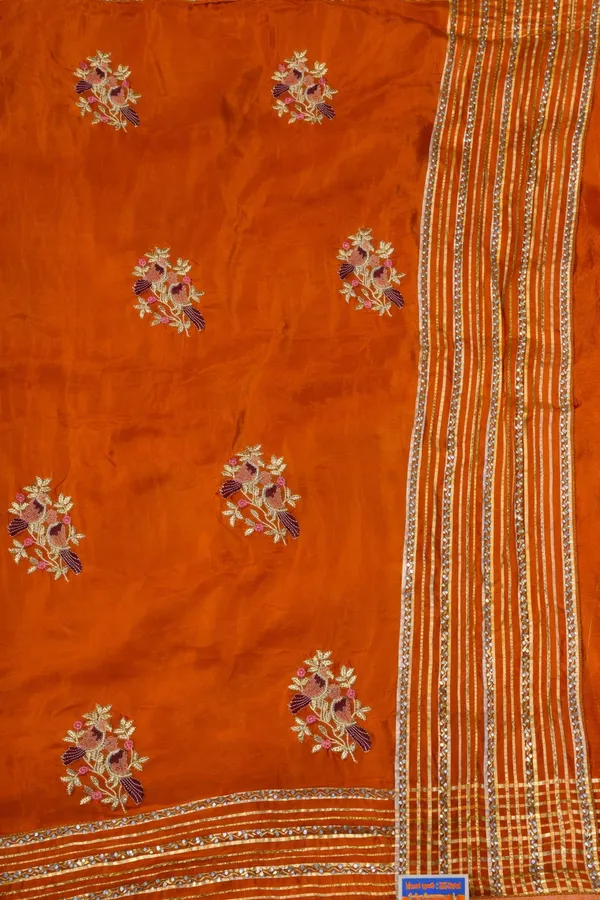 Orange_Embroidered_Saree_With_Golden_Border_And_Floral_Motifs
