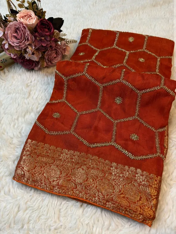 Rust_Orange_Georgette_Saree_With_Gota_Patti_Work_And_Woven_Border