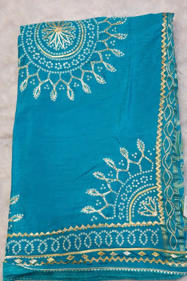 Turquoise_Blue_Bandhani_Saree_With_Golden_Embroidery_And_Border