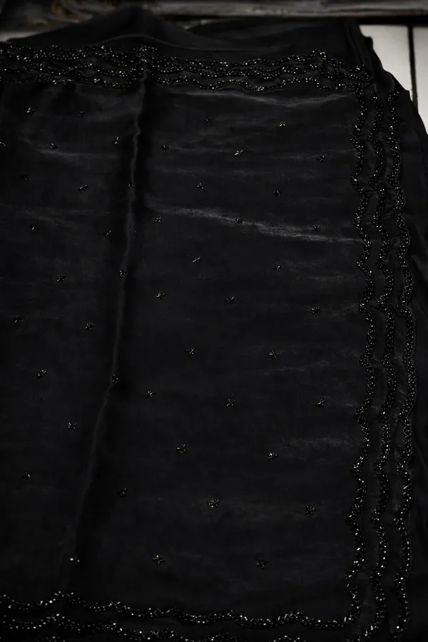 Black_Georgette_Saree_With_Embellished_Border_And_Sequin_Work