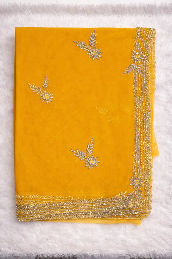 Yellow_Embellished_Organza_Saree_With_Golden_Border_And_Floral_Motifs