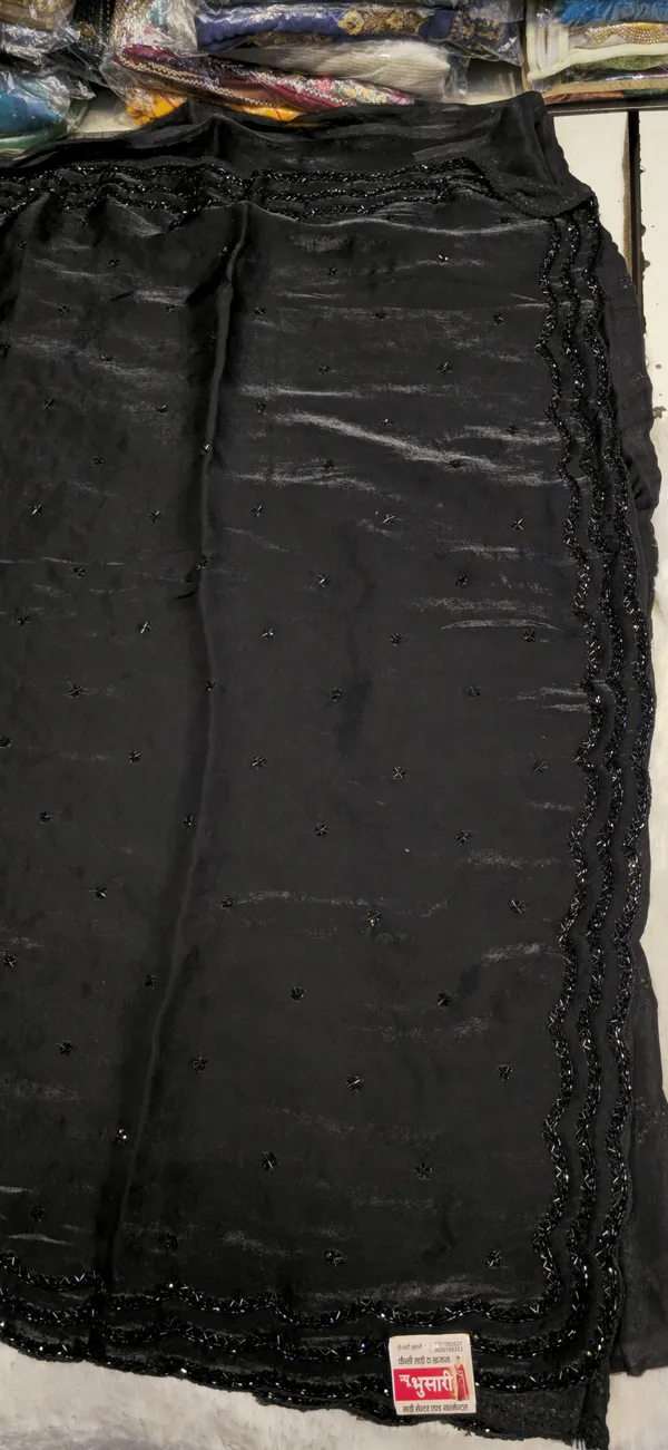 Black_Georgette_Saree_With_Embellished_Border_And_Sequin_Work