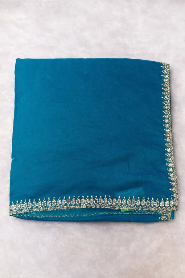 Blue_Georgette_Saree_With_Embellished_Border_And_Blouse_Piece