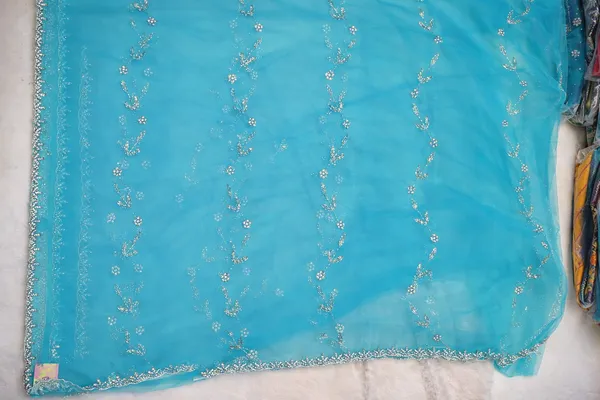 Turquoise_Blue_Embellished_Organza_Saree_With_Silver_Sequin_Work