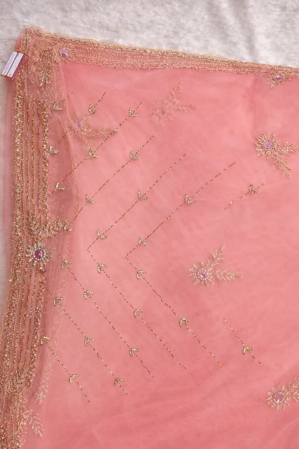 Pink_Embroidered_Net_Saree_With_Golden_Border_And_Embellishments