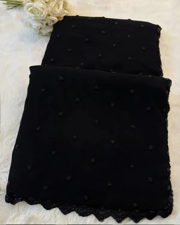 Black_Embellished_Chiffon_Saree_With_Kundan_Brooch