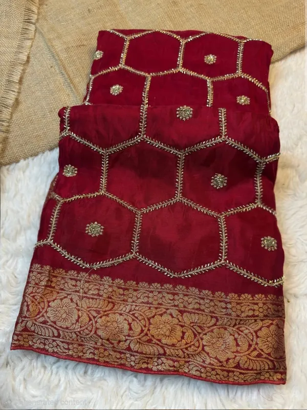 Maroon_Georgette_Saree_With_Golden_Embroidery_And_Zari_Border