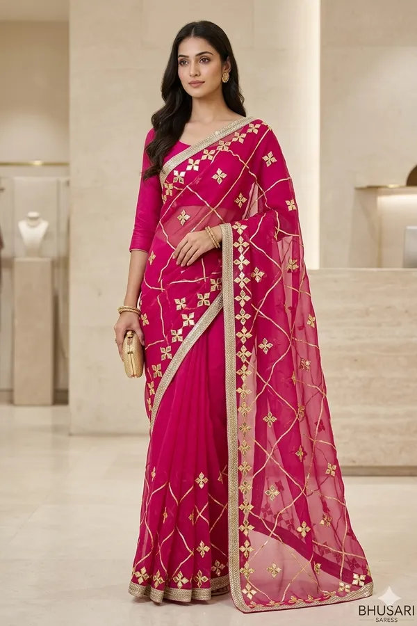 Magenta_Pink_Embroidered_Net_Saree_With_Golden_Floral_Work_And_Border