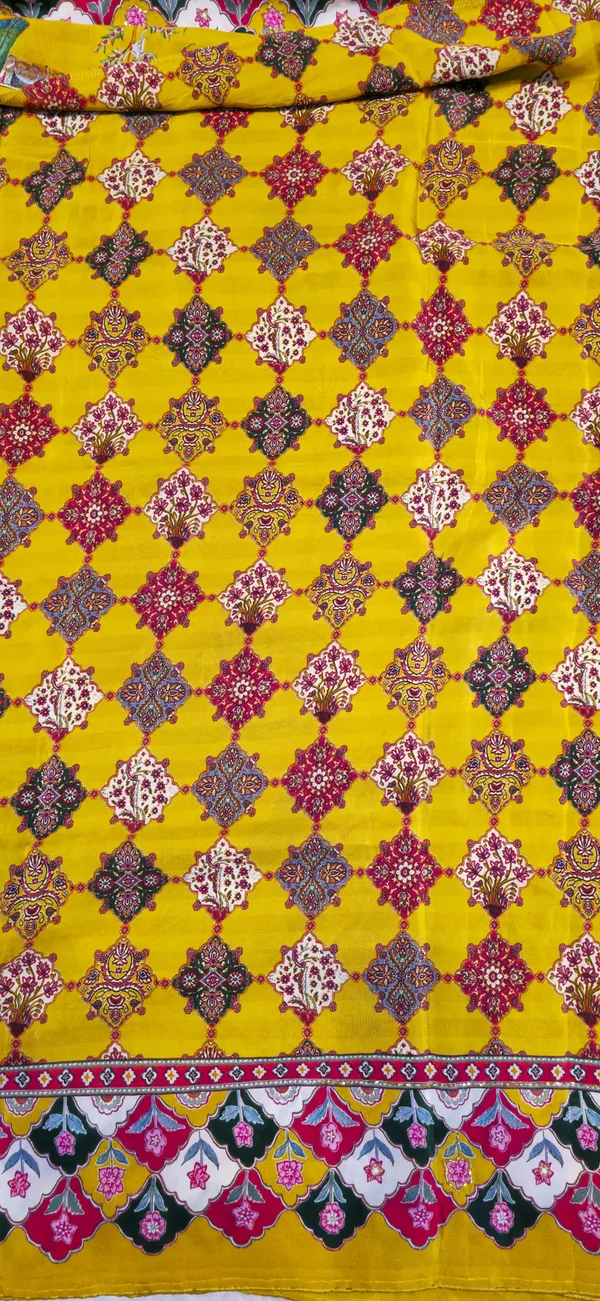 Yellow_Silk_Saree_With_Intricate_Ethnic_Motifs_And_Multicolor_Border