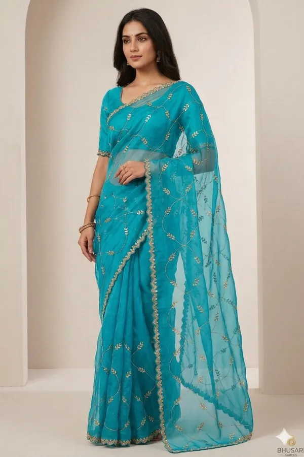 Turquoise_Embroidered_Organza_Saree_With_Golden_Border_And_Sequin_Work