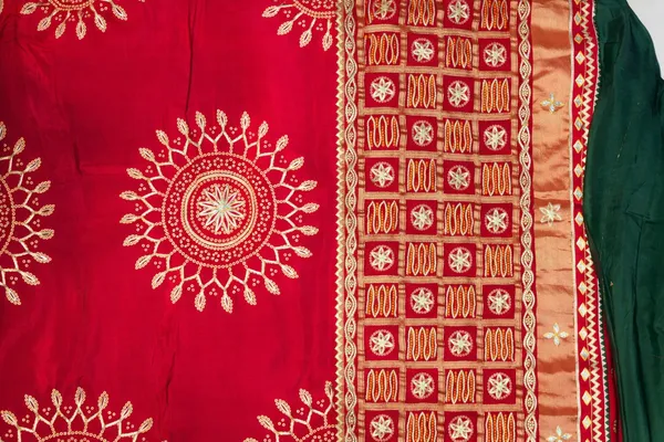Red_Bandhani_Print_Saree_With_Gold_Embroidered_Border_And_Blouse