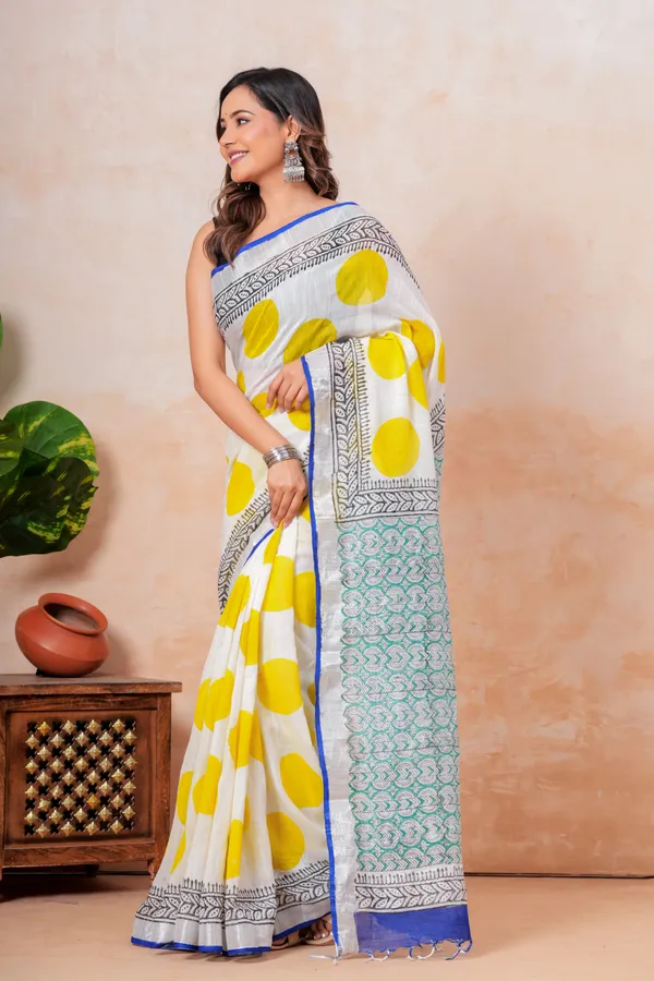 White_And_Yellow_Handloom_Saree_With_Geometric_Patterns_And_Contrast_Border