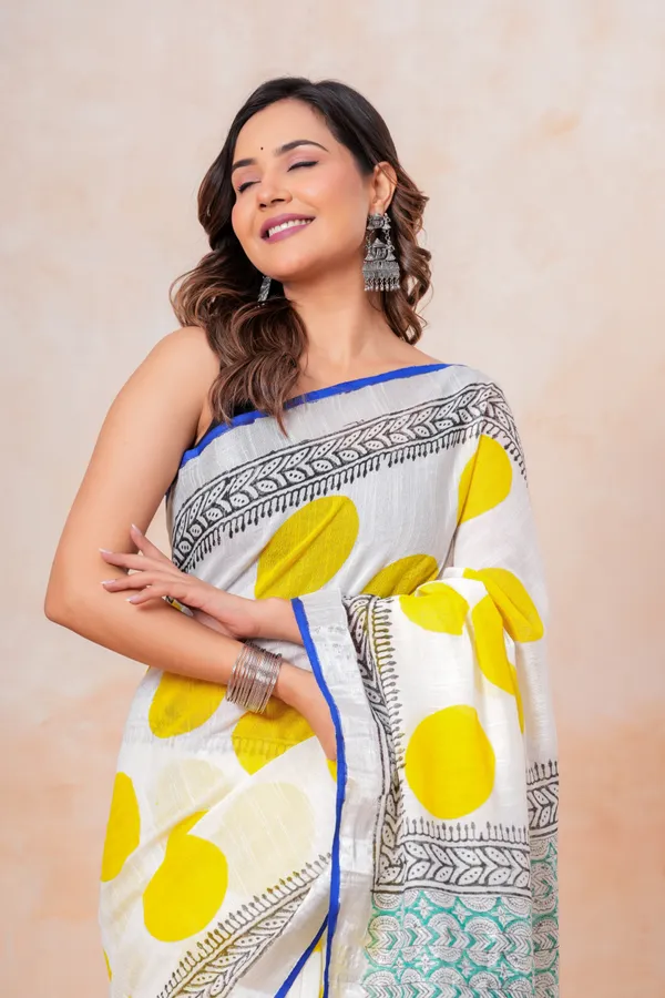 White_And_Yellow_Handloom_Saree_With_Geometric_Patterns_And_Contrast_Border