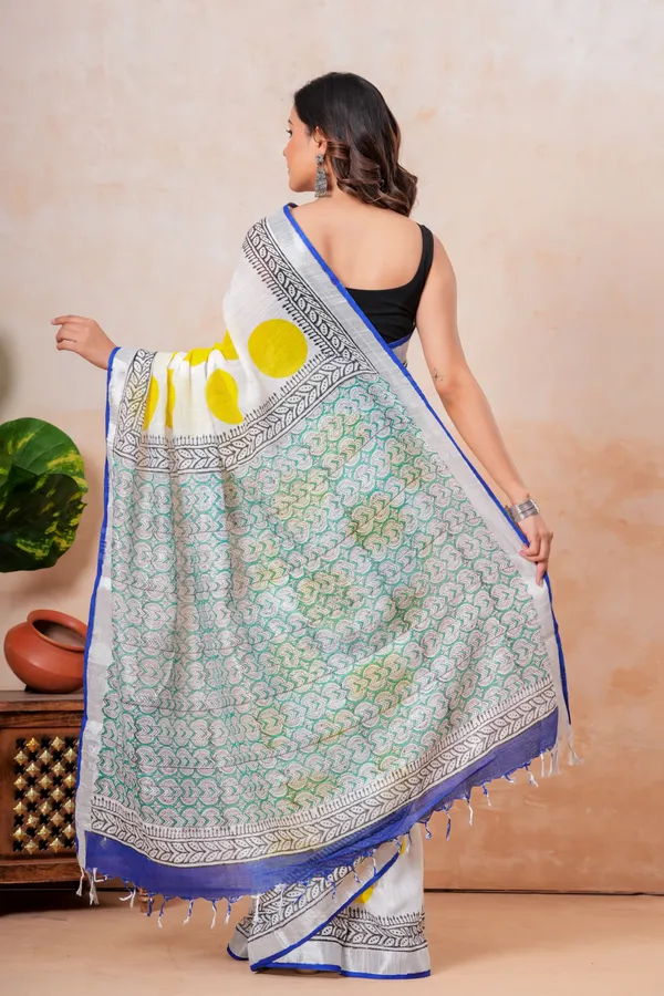 White_And_Yellow_Handloom_Saree_With_Geometric_Patterns_And_Contrast_Border