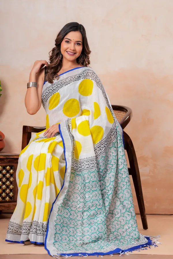 White_And_Yellow_Handloom_Saree_With_Geometric_Patterns_And_Contrast_Border