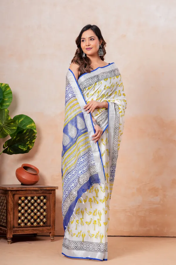 Elegant_White_And_Blue_Block_Printed_Linen_Saree_With_Zari_Border