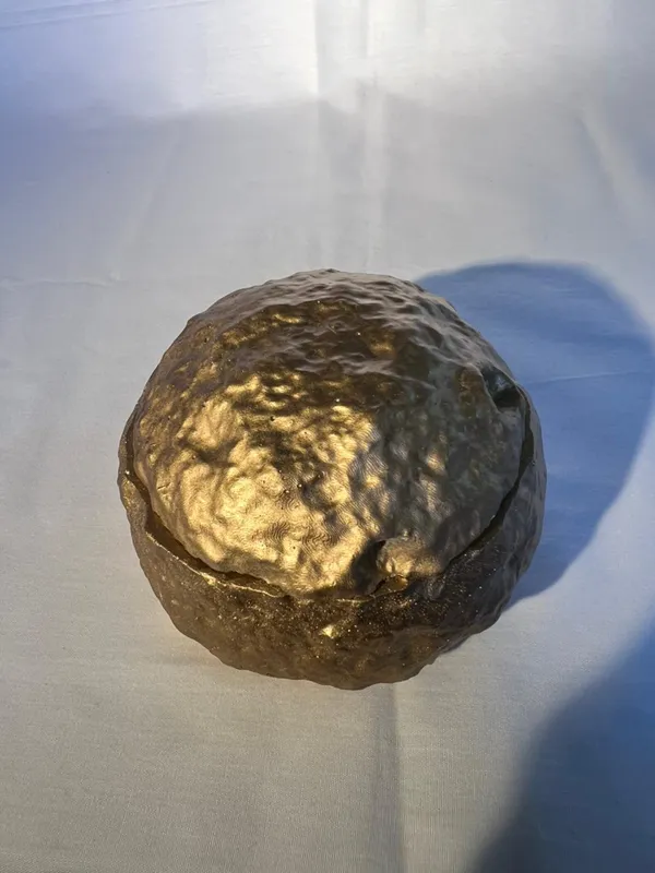 Handcrafted_Walnut_Shell_Jewelry_Box_With_Golden_Interior