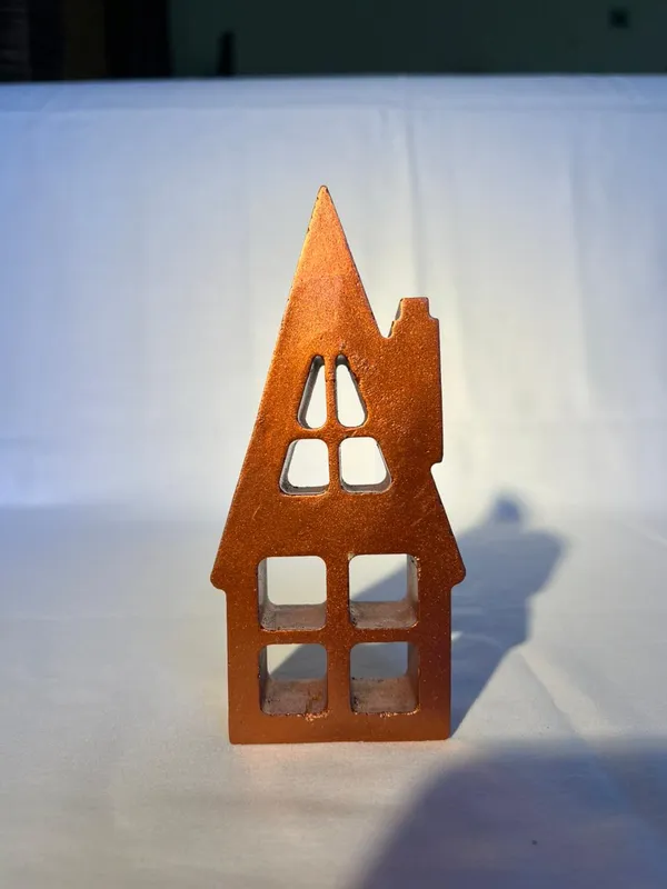 Rustic_Metal_House_Candle_Holder_With_Cutout_Windows