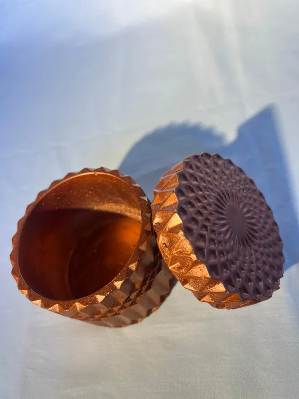 Handcrafted_Amber_Glass_Decorative_Storage_Jar_With_Geometric_Pattern