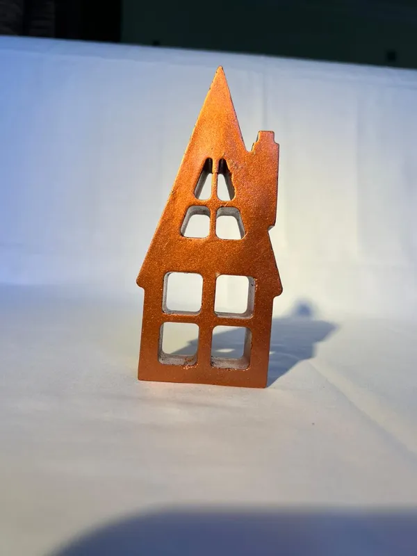 Rustic_Metal_House_Candle_Holder_With_Cutout_Windows