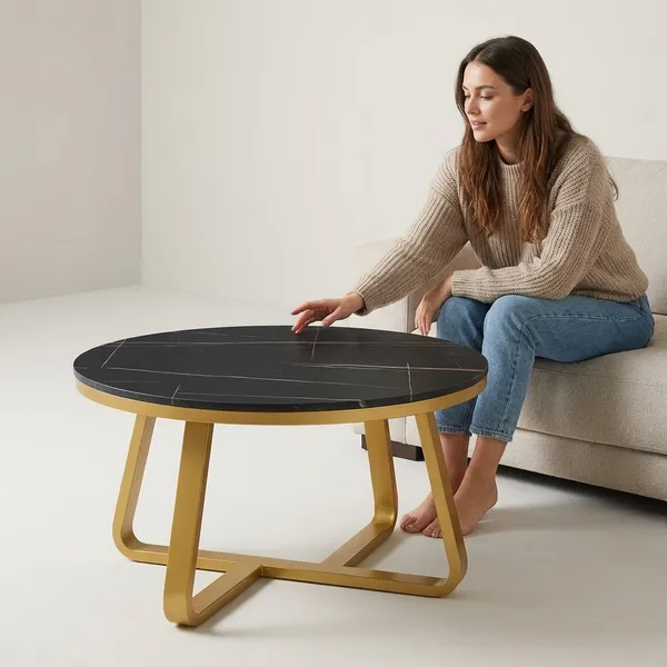 Modern_Round_Coffee_Table_With_Gold_Metal_Base_And_Black_Marble_Top