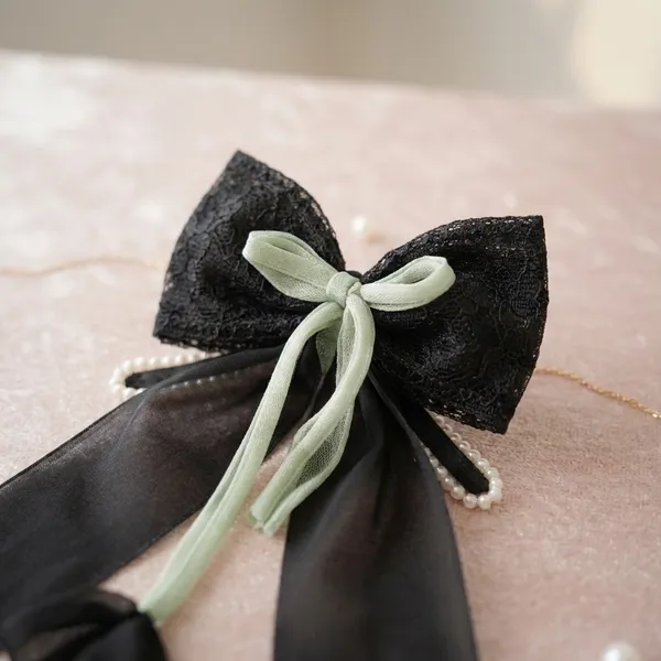 Black_Ribbon_Bow_With_Floral_Accents_Decorative_Gift_Accessory