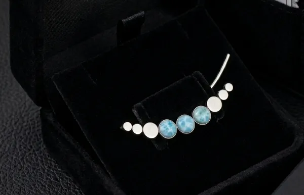 Silver_Ear_Climber_Cuff_Earring_with_Blue_Larimar-Inspired_Stones_–_Curved_Cartilage_Ear_Crawler,_Minimalist_Geometric_Ear_Wrap,_Lightweight_Statement_Jewelry_for_Women