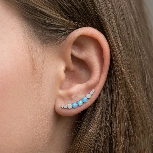 Silver_Ear_Climber_Cuff_Earring_with_Blue_Larimar-Inspired_Stones_–_Curved_Cartilage_Ear_Crawler,_Minimalist_Geometric_Ear_Wrap,_Lightweight_Statement_Jewelry_for_Women
