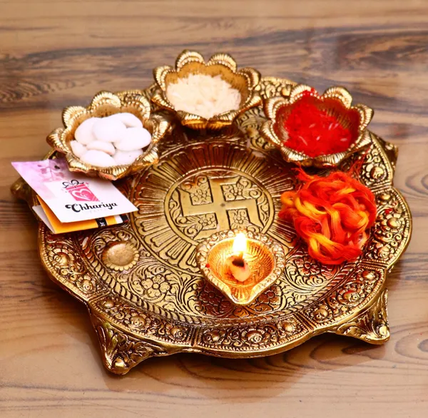 Chhariya_Crafts_Bhaiya_Bhabhi_Bhaiya_Bhabhi_Rakhi_Combo_Gift_Set_1_Metal_Pooja_Thali,_Chawal_Roli_Pack,_1_Designer_Lumba_Rakhi_For_Bhabhi,_1_Designer_Rakhi_For_Bhaiya_Brother,_2_Extra_Rakhi_)_Assorted,_Gold_Finish,_Kundan,_Pearl,_Plastic_(PVC)_Rakhi,_Thali,_Chawal_Roli_Pack__Set_(1_Pooja_Thali,_Chawal_Roli_Pack,_1_Designer_Lumba_Rakhi_For_Bhabhi,_1_Designer_Rakhi_For_Bhaiya_Brother,_2_Extra_Rakhi_))