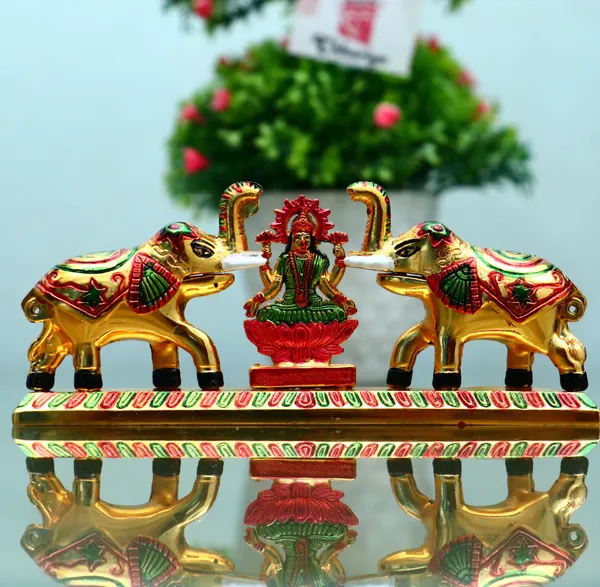 Chhariya_Crafts_Bhaiya_Bhabhi_Bhaiya_Bhabhi_Rakhi_Combo_Gift_Set_Assorted_Rakhi,_Lumba,_Chawal_Roli_Pack,_Showpiece__Set_(1_Metal_Laxmi_Idol_with_kumkum_box_and_elephant_pair,_Chawal_Roli_Pack,_1_Designer_Lumba_Rakhi_For_Bhabhi,_1_Designer_Rakhi_For_Bhaiya_Brother,_2_Extra_Rakhi)