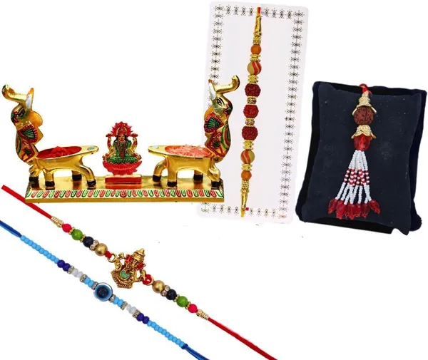 Chhariya_Crafts_Bhaiya_Bhabhi_Bhaiya_Bhabhi_Rakhi_Combo_Gift_Set_Assorted_Rakhi,_Lumba,_Chawal_Roli_Pack,_Showpiece__Set_(1_Metal_Laxmi_Idol_with_kumkum_box_and_elephant_pair,_Chawal_Roli_Pack,_1_Designer_Lumba_Rakhi_For_Bhabhi,_1_Designer_Rakhi_For_Bhaiya_Brother,_2_Extra_Rakhi)