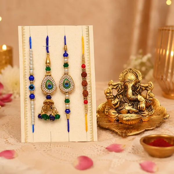 Chhariya_Crafts_Bhaiya_Bhabhi_Rakhi_Combo_Set_1_Ganesh,_Chawal_Roli_Pack,_1_Designer_Lumba,_3_Rakhi_Assorted,_Gold,_Gold_Finish,_Jute,_Kundan,_Mauli_Thread,_Pearl,_Yarn_Rakhi,_Chawal_Roli_Pack,_Showpiece__Set_(1_Ganesh,_1_Chawal_Roli_Pack,_1_Designer_Lumba,_3_Rakhi)