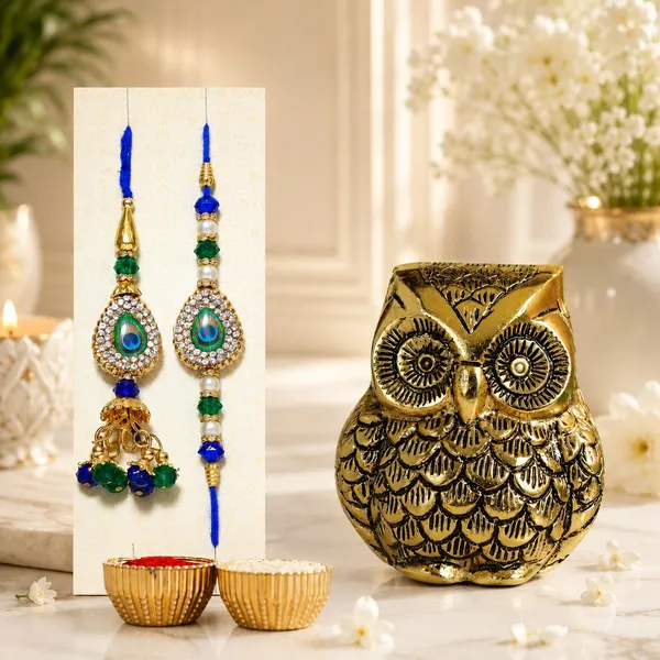 Chhariya_Crafts_Bhaiya_Bhabhi_Bhaiya_Bhabhi_Rakhi_Combo_Gift_Set_Assorted,_Gold,_Gold_Finish,_Jute,_Kundan,_Mauli_Thread,_Pearl,_Yarn_Rakhi,_Chawal_Roli_Pack,_Showpiece__Set_(1_Owl_Vastu_Statue,_1_Chawal_Roli_Pack,_1_Designer_Lumba,_1_Designer_Rakhi)