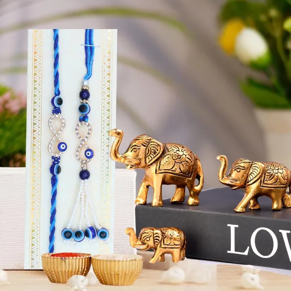 Chhariya_Crafts_Bhaiya_Bhabhi_Bhaiya_Bhabhi_Rakhi_Combo_Gift_Set_Assorted,_Gold,_Gold_Finish,_Jute,_Kundan,_Mauli_Thread,_Pearl,_Yarn_Rakhi,_Chawal_Roli_Pack,_Showpiece__Set_(1_Elephant_Set,_1_Chawal_Roli_Pack,_1_Designer_Lumba,_1_Designer_Rakhi)