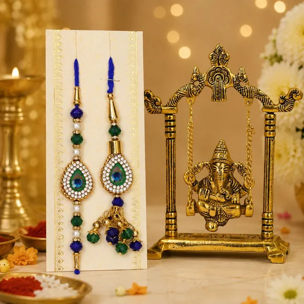 Chhariya_Crafts_Bhaiya_Bhabhi_Bhaiya_Bhabhi_Rakhi_Combo_Gift_Set_Assorted,_Gold,_Gold_Finish,_Jute,_Kundan,_Mauli_Thread,_Pearl,_Yarn_Rakhi,_Chawal_Roli_Pack,_Showpiece__Set_(1_Ganesh_Ji_Jhula,_1_Chawal_Roli_Pack,_1_Designer_Lumba,_1_Designer_Rakhi)