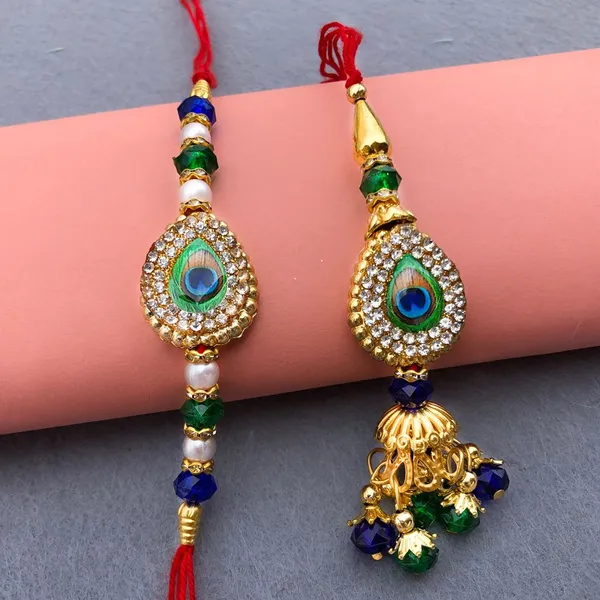 Chhariya_Crafts_Bhaiya_Bhabhi_Bhaiya_Bhabhi_Rakhi_Combo_Gift_Set_Assorted,_Gold,_Gold_Finish,_Jute,_Kundan,_Mauli_Thread,_Pearl,_Yarn_Rakhi,_Chawal_Roli_Pack,_Showpiece__Set_(1_RamLalla_Idol,_1_Chawal_Roli_Pack,_1_Designer_Lumba,_1_Designer_Rakhi)