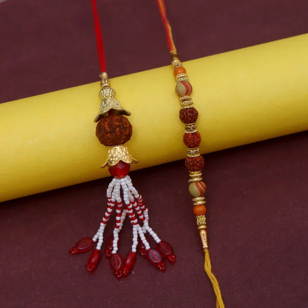 Chhariya_Crafts_Bhaiya_Bhabhi_Bhaiya_Bhabhi_Rakhi_Combo_Gift_Set_Assorted,_Gold,_Gold_Finish,_Jute,_Kundan,_Mauli_Thread,_Pearl,_Yarn_Rakhi,_Chawal_Roli_Pack,_Showpiece__Set_(1_Duck_Pair_Showpieces,_1_Chawal_Roli_Pack,_1_Designer_Lumba,_1_Designer_Rakhi)